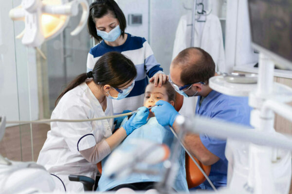 Parent comforting daughter in the course of dental treatment in dentist office. Mother with her kid in stomatology clinic for teeth examine using modern instruments. SSUCv3H4sIAAAAAAAACnSUyY7jNhCGX8Xg2WxwX3wLMslksgCDHGYOoyDgJltoSTS0TNAw+t1TlJxub7nYVFWxyPr4V52Qd2MT0O6Emradx2lwU5N7tCNbNKQ+pmFZfh+4IssqxWbKQ+Pa5cu7KRx61yW06+e2fd2icXLTPKaxZOzyOB0PecrwRbcoDsl149SUaKa3iDI+1OvSN/txyuF5iUY7vkUuZp8W2xpxzH2U69K1rntZl+NhnqY0XMR1udw/talL/TQuqYLrL5OXqJiOeWzeLldML+6la8JQTocygpvSHupcCzkz+nYqdrRDCE6efVm8bh/Y/oI77lMf4JKnV0g2wHXcwuQbitI6R5zHspYGizpqbOqgcQ2/Slpqg60hVQ1/LHmJqaYei8Br7K2z2DJjnPXCJW8hzCjnak8pTtQxLJyw2FAisHFaG0oNpAgQJmvhFRURBzgVC+kNdgZ+kouEq2BtkALCVBRSU2swC45jQRjBxuqIHdeURc8cjTWC4p7/AeZdIQPFuTk2AO2Evufg2kIcjMehCU2/XyPydCgyAlB57qfhZYXV5nx0vgUt1LAtbdHBjSMExLOhPALoMXdrkj5PBWDZGeFtYEU5p5ITo7iEFSeWov/kd2hgYznohOZjm11McdFjed9VCiB10KQCCXJtJCj5SqvFLojQN6Jd7ZTod/Femm5EfOm6VPPZTq16U/XZZOm7ui9N1ypfPYzwB2o/+4yhd7JfXYIzcSf/1SWpspdtQBVkoowRXdp69l0Dl1g43lcjlNGPWAlD7A2r1XRVuBJWPK5y9Tyu0nBC/we6gTd9XKUkjNMryEJIQ9VDXBLeTohbJhwK0KL09RLfxPGWCYJX55IpXZrqEgpixHJNlOLojQoEuH0eAwCBSEah6wj0IHpjhKjQmkojiu0aEqKWGAnshUb3mBDUYLWWCt1hQoIo6BnNykVuOCEBwjfS2uI7g0JCG+YJzJgAQsFCB5gxSkuckhLBLsffAETGCimZZOB6B4i41UQLpmByogbUhKJgUdhAsaeRYDhbYit5xFbXkULn+mDLCFv7uCQu06DOQ7dM3cGNgGMZJzB9jm46gPH3XVWRp83ncpHND3/++MunLz9VlXjafAA8m695eIbZtLrHqoInBQ8gg6GxwZvfmrj50gAPWP/8oarouq2qPv3x8W8K7/P06+eP6PVfAAAA//8DAKAFAM45BwAA